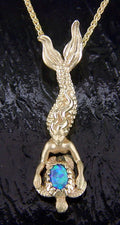 Steven Douglas Gold Mermaid diving with an Opal Turtle Pendant